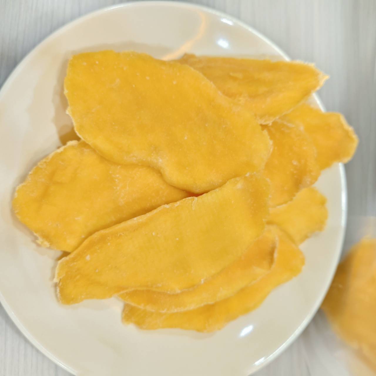 Dried mango on plate